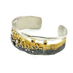 Silberarmband mit weißen und schwarzen Diamanten
