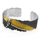 Armband aus vergoldetem, oxidiertem Silber mit Smaragd