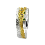 Vergoldetes Silberarmband mit Diamanten und Smaragden