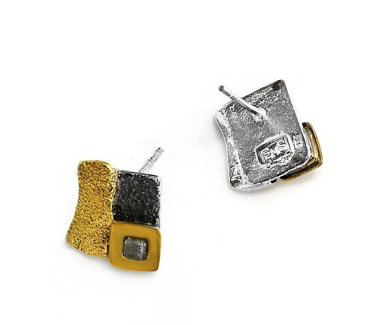Ohrringe aus vergoldetem, oxidiertem Silber mit Diamanten