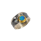 Oxidierter Silberring mit Doublet-Opal und Schweizer Topas-Steinen