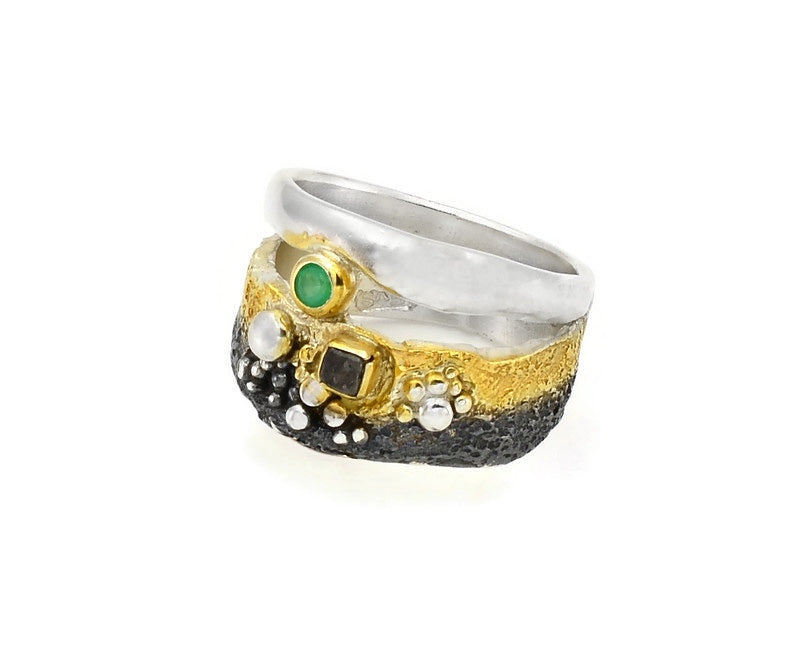Oxidierter Silberring mit Diamant und Smaragd