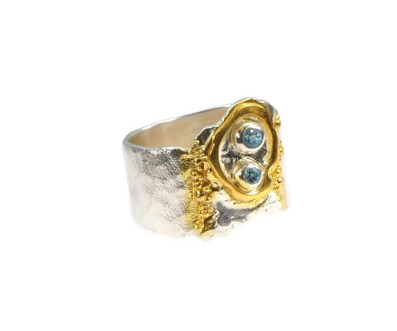 Ring aus Sterlingsilber mit zwei Schweizer Topas-Steinen