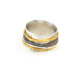 Ring aus oxidiertem Silber mit vergoldeten Ringen