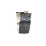 Ring aus vergoldetem, oxidiertem Silber mit schwarzem Diament
