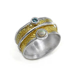 Vergoldeter Silberring mit Perle und Blau Topas