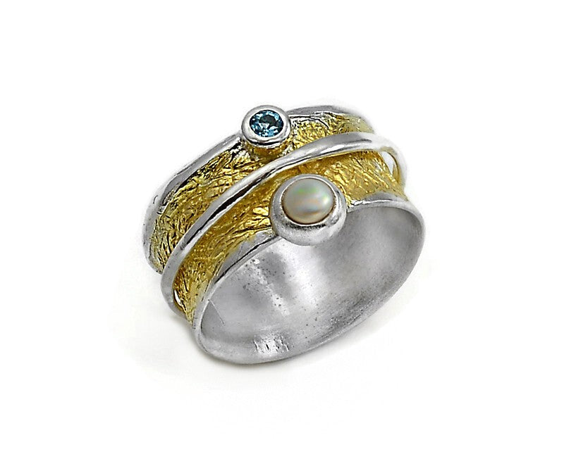 Vergoldeter Silberring mit Perle und Blau Topas